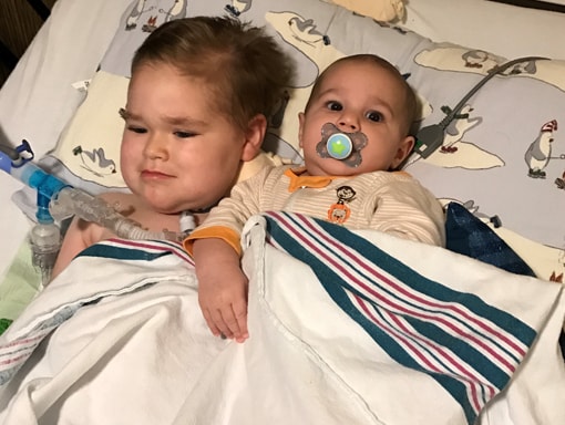 Jack at home with his brother.