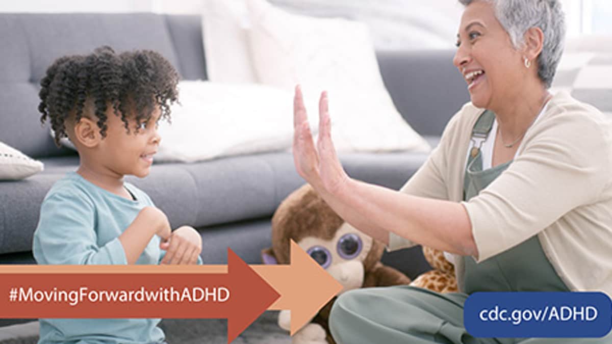A young child and grandmother playing and enjoying each other's company at home. Visit cdc.gov/ADHD to learn more about #Moving ForwardwithADHD.
