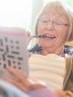 cognitive-decline-1 Elderly woman working a crossword puzzle