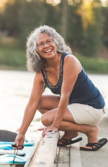 Elderly woman on a dock