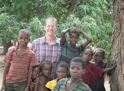 Epidemic Intelligence Service Officer Dr. Mark Lehman with children in eastern Zambia Epidemic Intelligence Service Officer Dr. Mark Lehman with children in eastern Zambia.