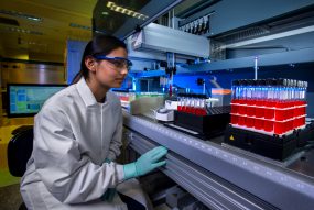 Labs_NCEH_CDC_9306c Scientist managing human samples in a lab.”