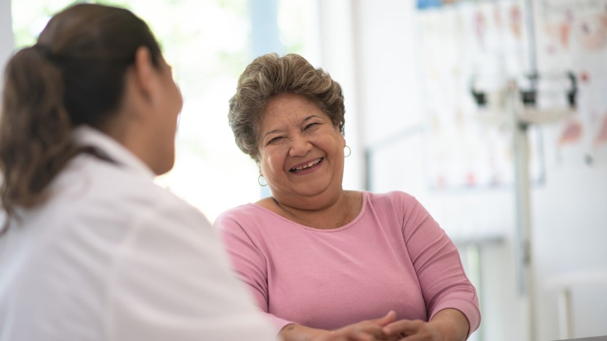 Photo of a woman talking to her doctor