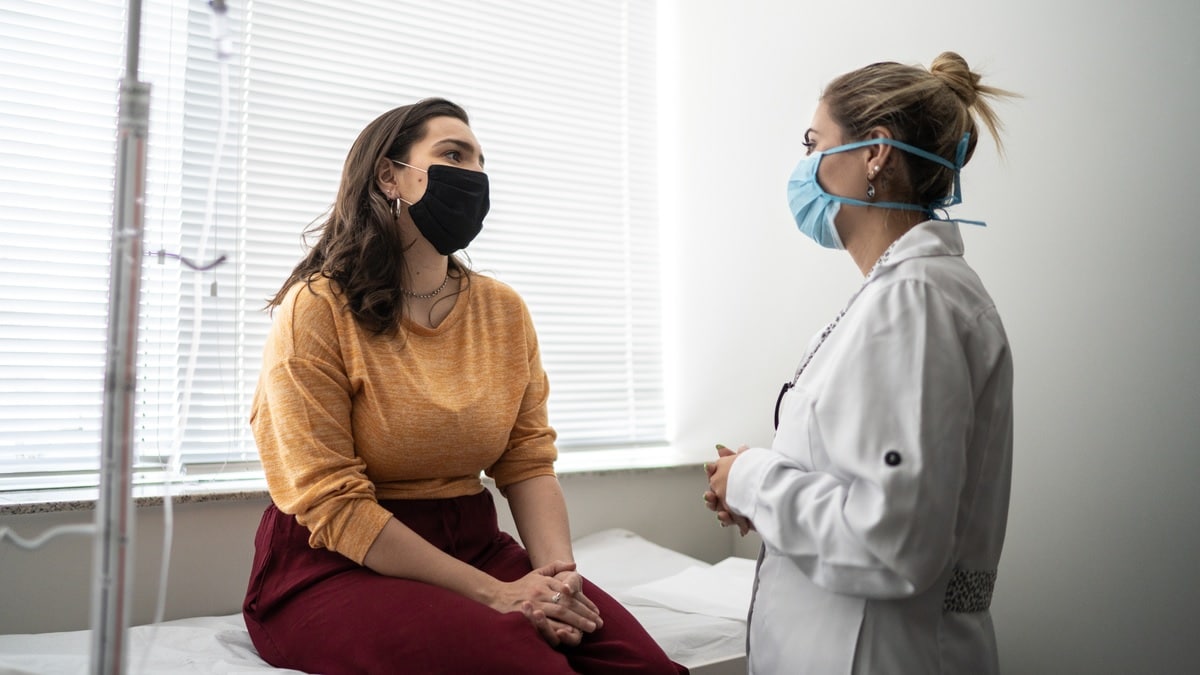 Photo of a woman talking to her doctor
