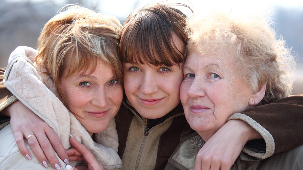 three women hugging
