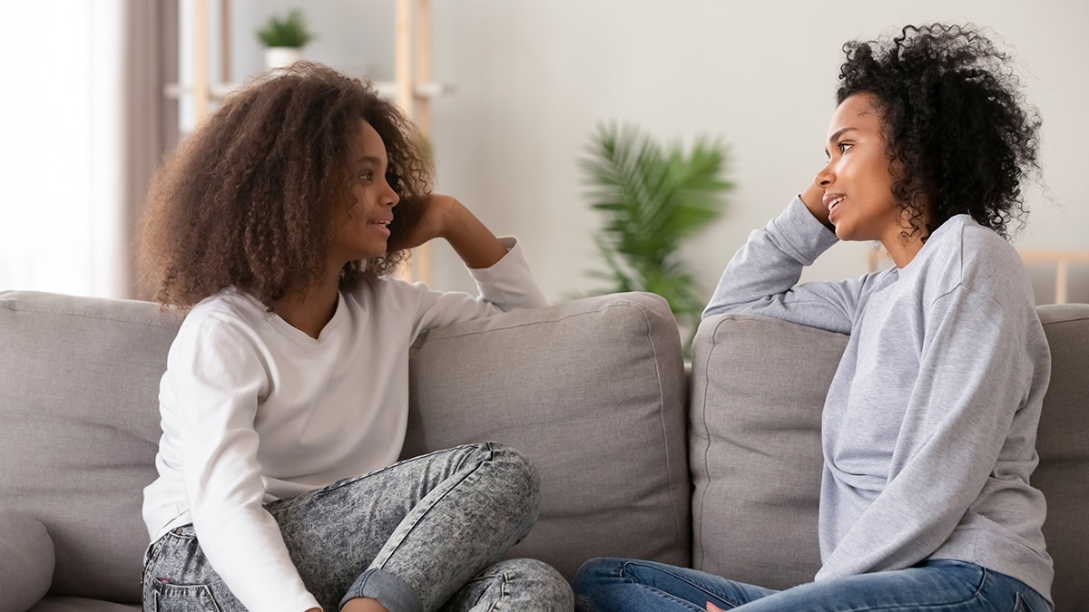 Women Talking a mother and daughter in a serious conversation