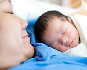 vitamin-k A mother holding her newborn child