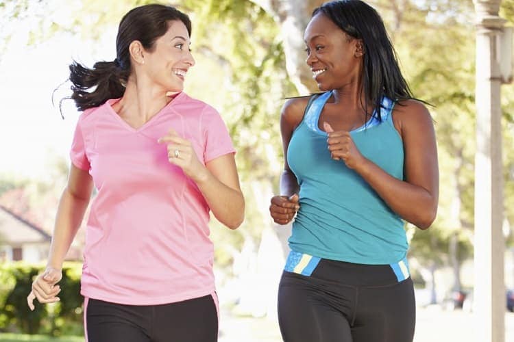 Photo of two women jogging