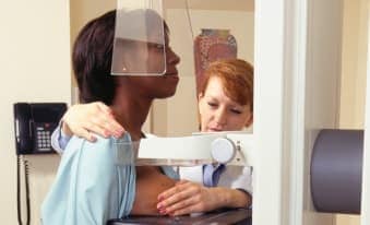 Photo of a woman getting a mammogram