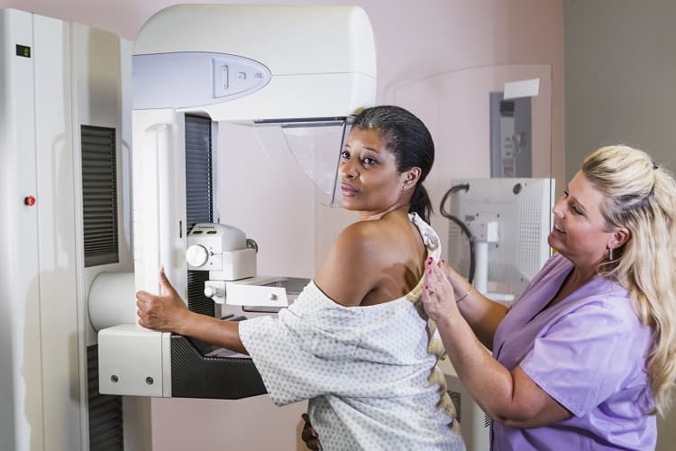 Photo of a woman getting a mammogram
