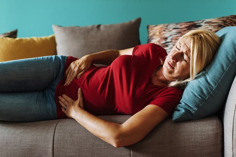 Photo of a woman with abdominal pain