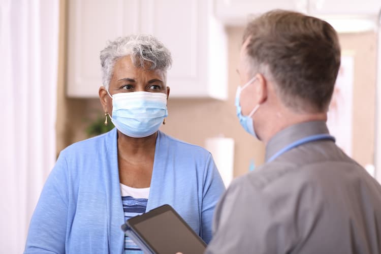 Photo of a patient talking to a doctor