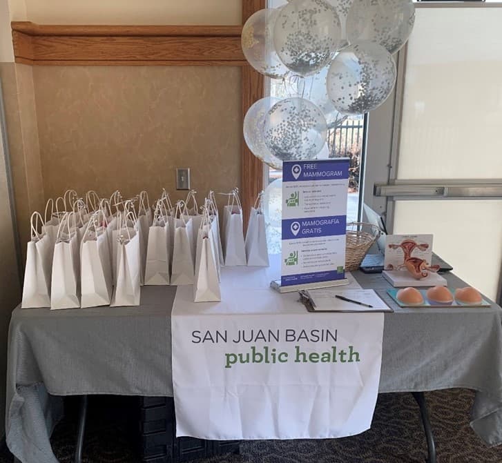 Photo of a table with information about free mammograms offered by San Juan Basin Public Health.