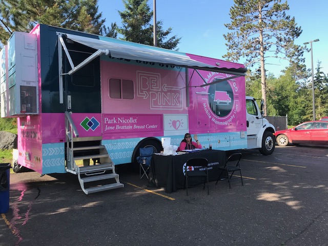 park-nicollet-mammobus-minnesota Photo of a health care worker in front of a Park Nicollet Mobile Mammography Unit