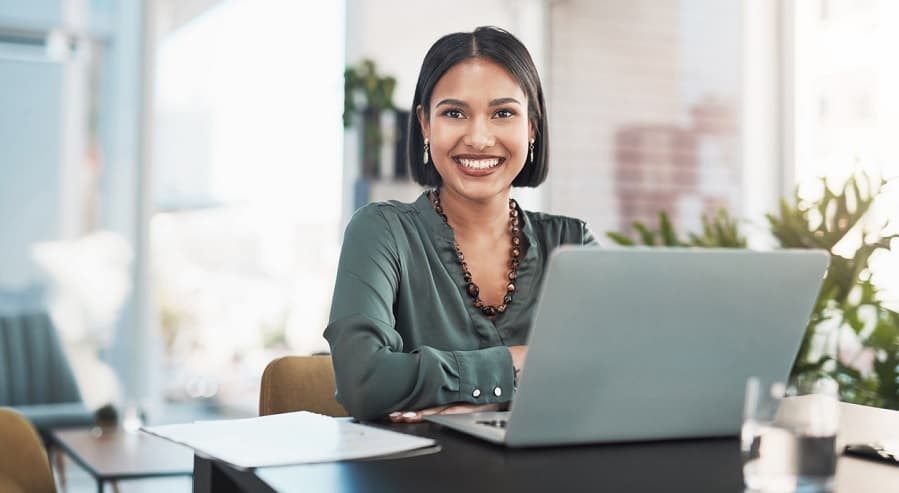 Explore the latest U.S. Cancer Statistics from the first year of the pandemic Photo of a woman using a laptop computer