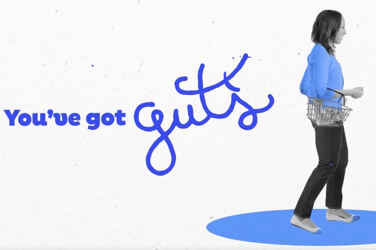 Woman with a basket of groceries next to the phrase "You've got guts"