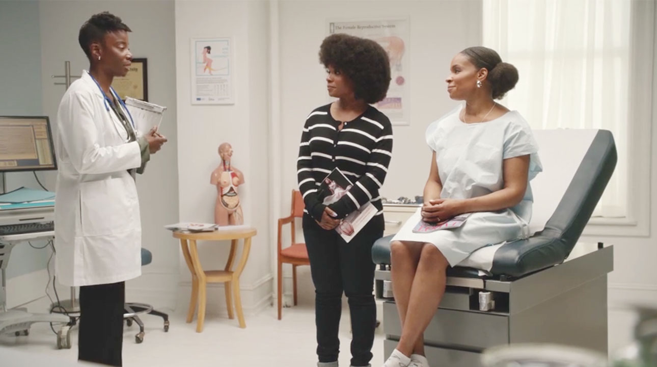 Dr. Stewart, a gynecologist, talking to Amber and Lacey