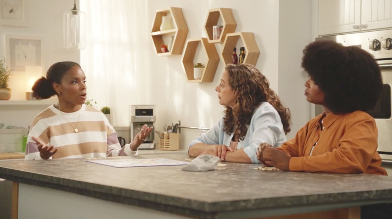 Amber playing Scrabble with her friend Jenny and her sister Lacey