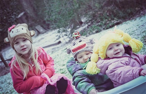 kellys-story-kids-home-500px.jpg Savannah, Caden, and Kylie play in the snow after they arrived home.