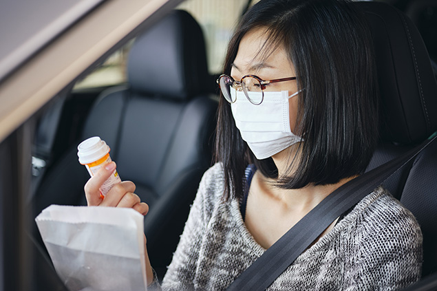 Prevent and Manage High Cholesterol A doctor speaking to a male patient.