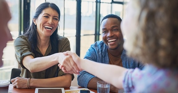 career professionals meeting and shaking hands