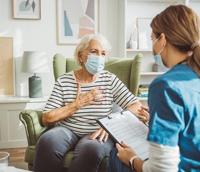 Care professional with patient Care professional with patient