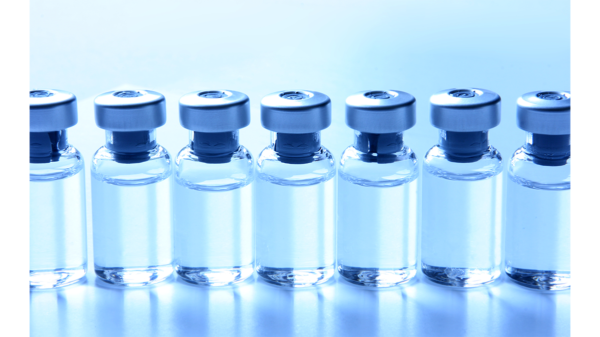 schedule and dosing thumbnail A line of vials containing clear liquid on a blue background.