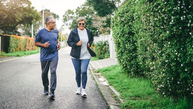 Full length shot of a senior couple bonding together while running outdoors Full length shot of a senior couple bonding together while running outdoors