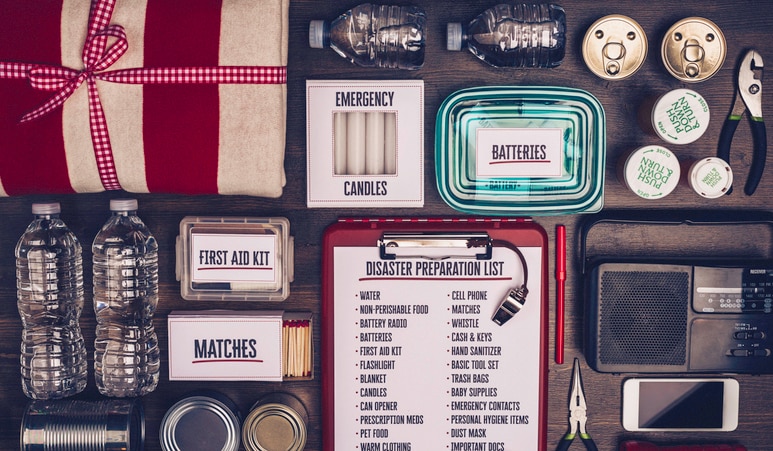 Disaster preparation kit flat lay. Items needed for disaster preparedness Disaster preparation kit flat lay. Items needed for disaster preparedness.