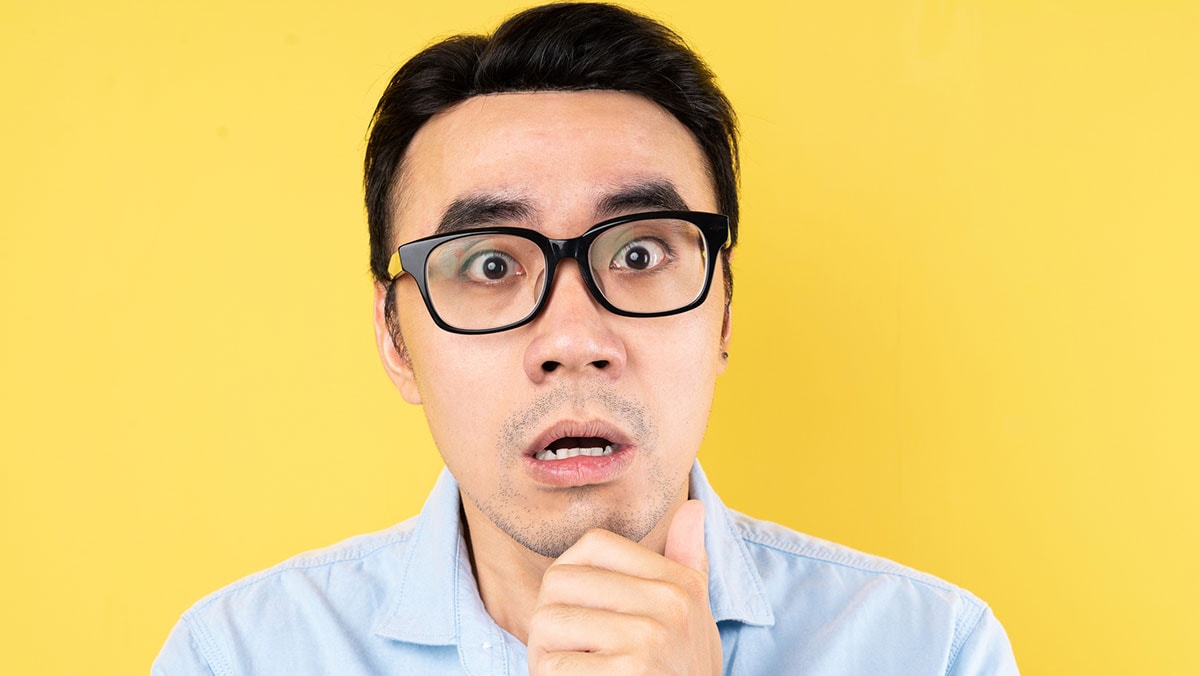 blood-sugar.jpg Man wearing glasses with hand over mouth