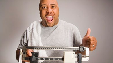 Man on a scale Man on a scale