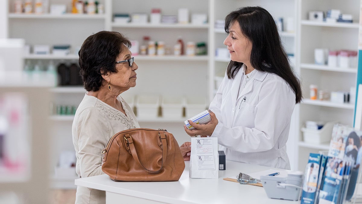 pharmacy-image-cr Pharmacist talking to customer