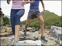 activity couple running outside on a trail