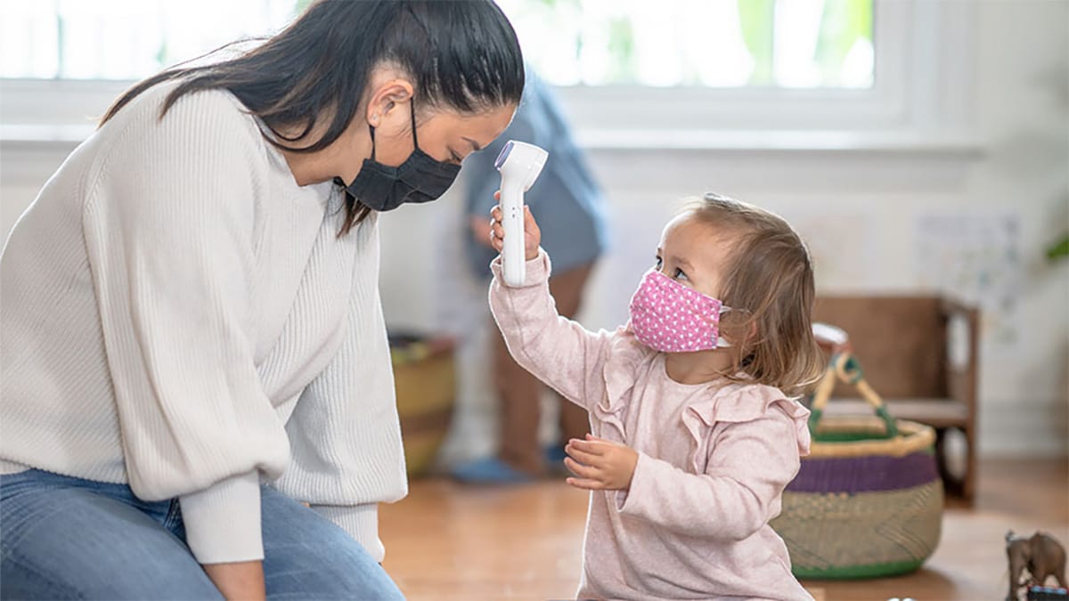 Toddler taking care giver's temperature Toddler taking care giver's temperature