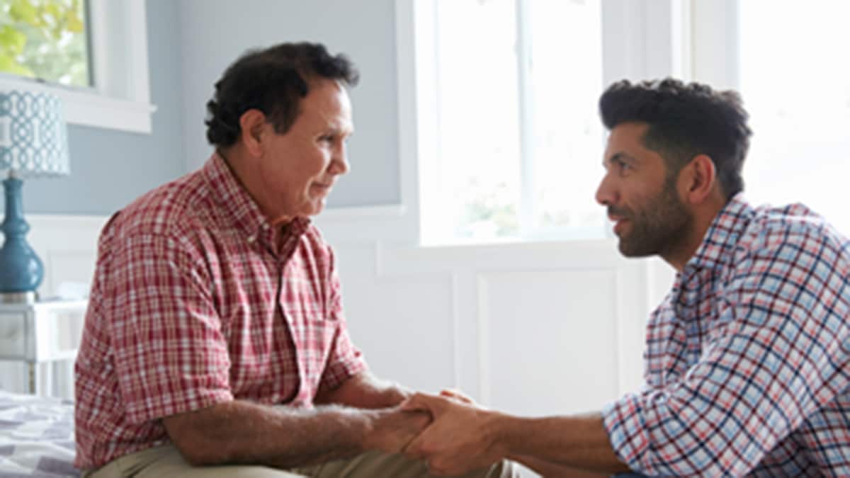 PreventingEA Younger man helping an older man