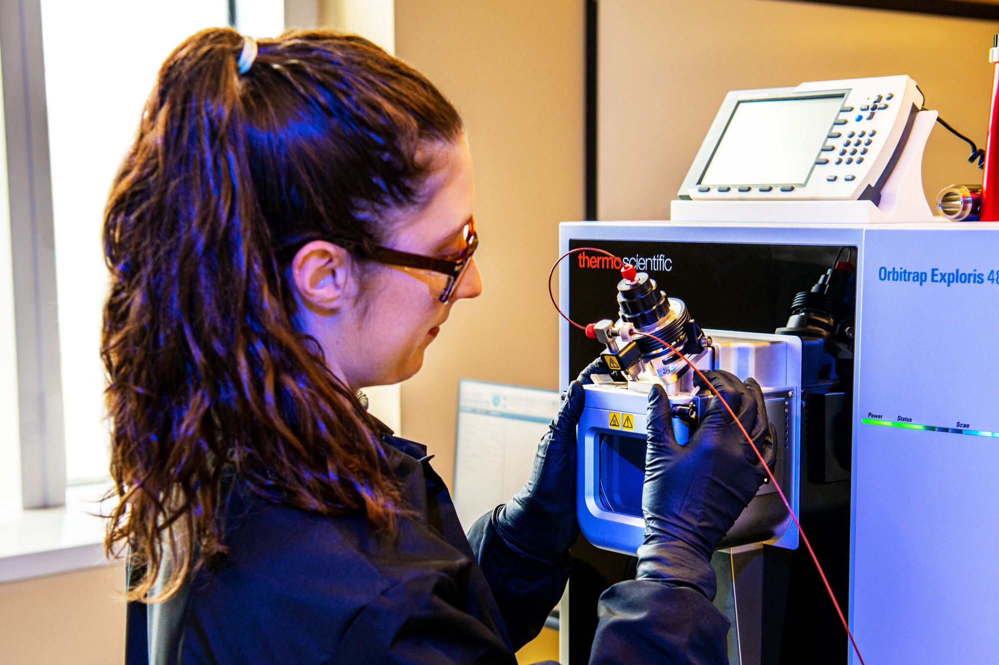 decorative: female scientist in lab