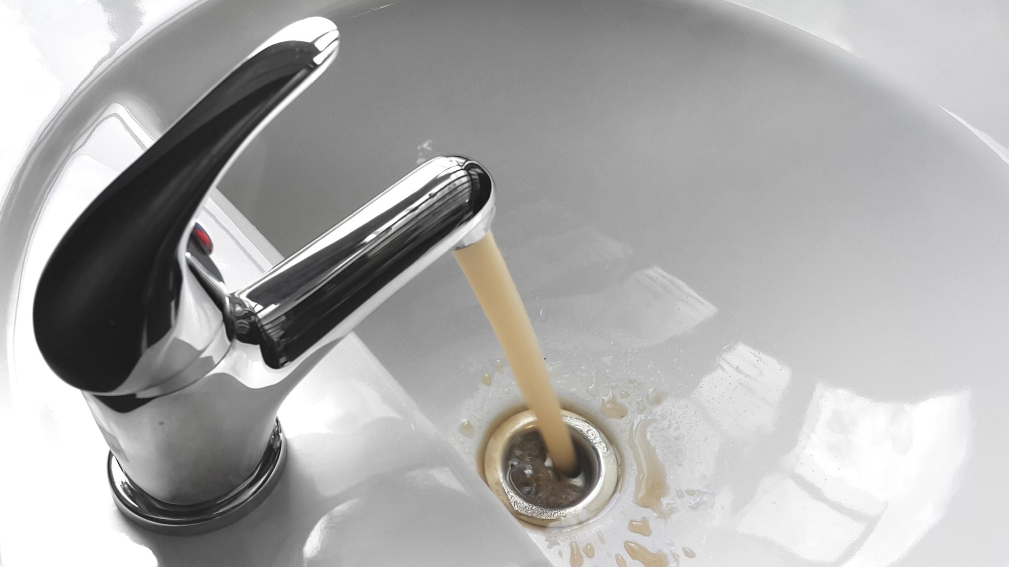 Discolored water coming from faucet.