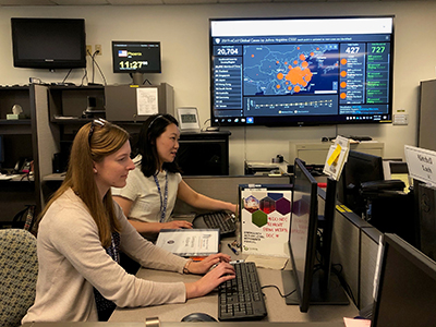 Dr. Amy Xie working at computer