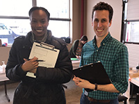 eis-officers-survey-200px Two EIS officers holding surveys on clipboards