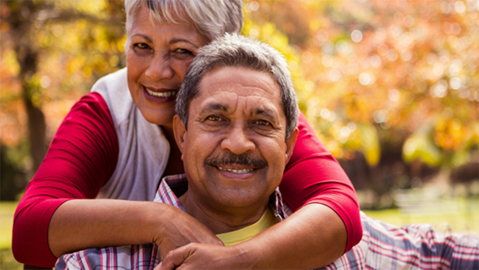 Older adult couple outside.