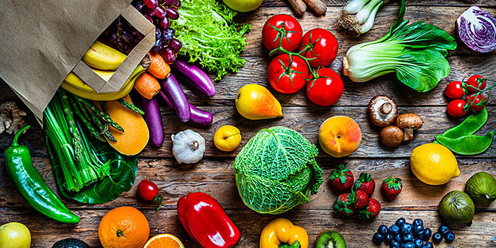 Fruit and Vegetable Safety Assorted fruits and vegetables on table top