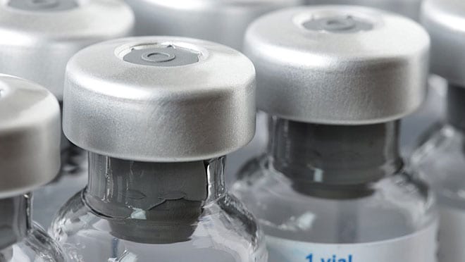 Two vaccine vials Close-up of multiple vaccine vials