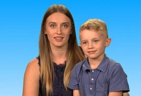 — title missing — Tyler, who suffered from Salmonella infection, and his mother Erika