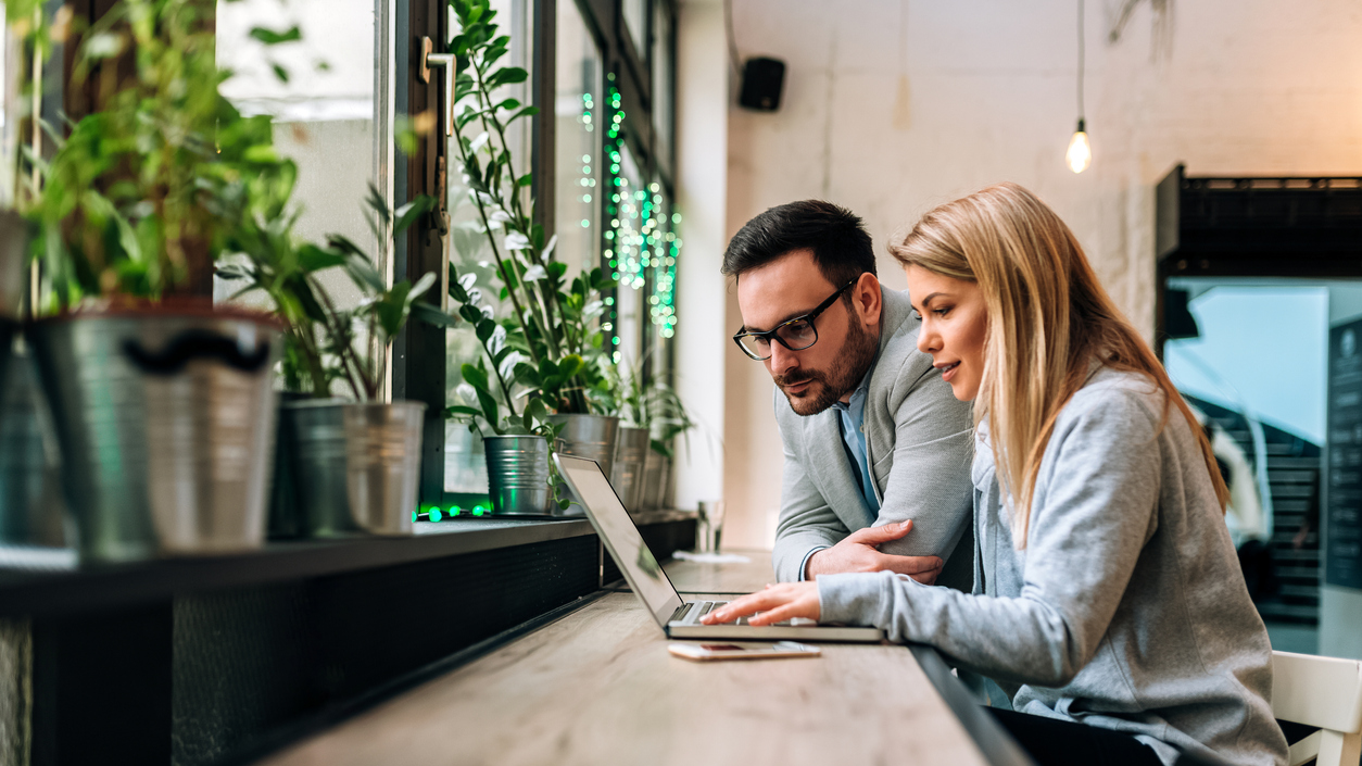 Man and woman developing their work plan
