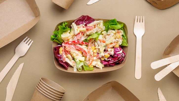 — title missing — Salad with compostable bowls, flatware, and cups.