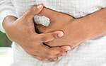 symptoms-page-fb-tw-cr hands on stomach