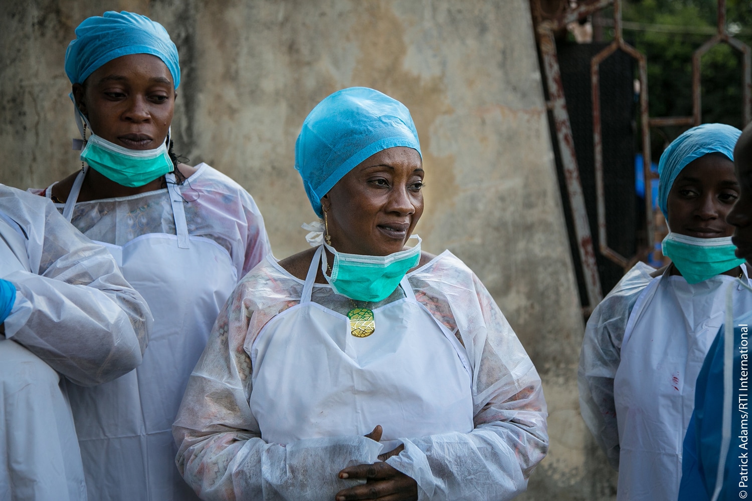 Guinea Healthcare Workers Group of women in personal protective equipment.