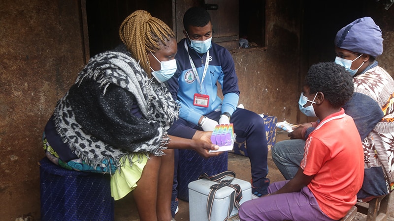 -- title missing -- Photo of people living with HIV receiving care during worldwide public health emergency.