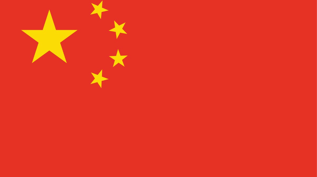 Flag_China Flag is red with a large yellow five-pointed star and four smaller yellow five-pointed stars (arranged in a vertical arc toward the middle of the flag) in the upper hoist-side corner.
