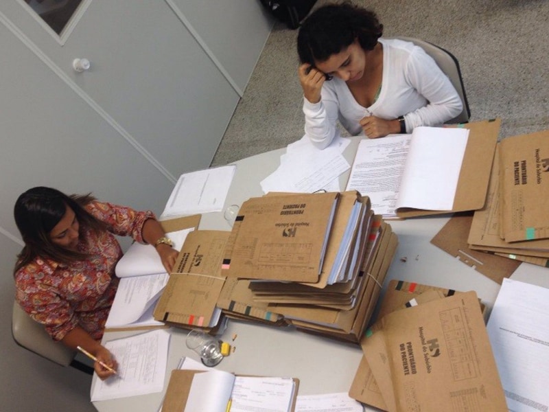 brazil-med-records_800x600 FETP residents reviewing medical records during investigation of Guillain-Barre Syndrome during Zika epidemic in Salvador, Bahia, Brazil (2017).